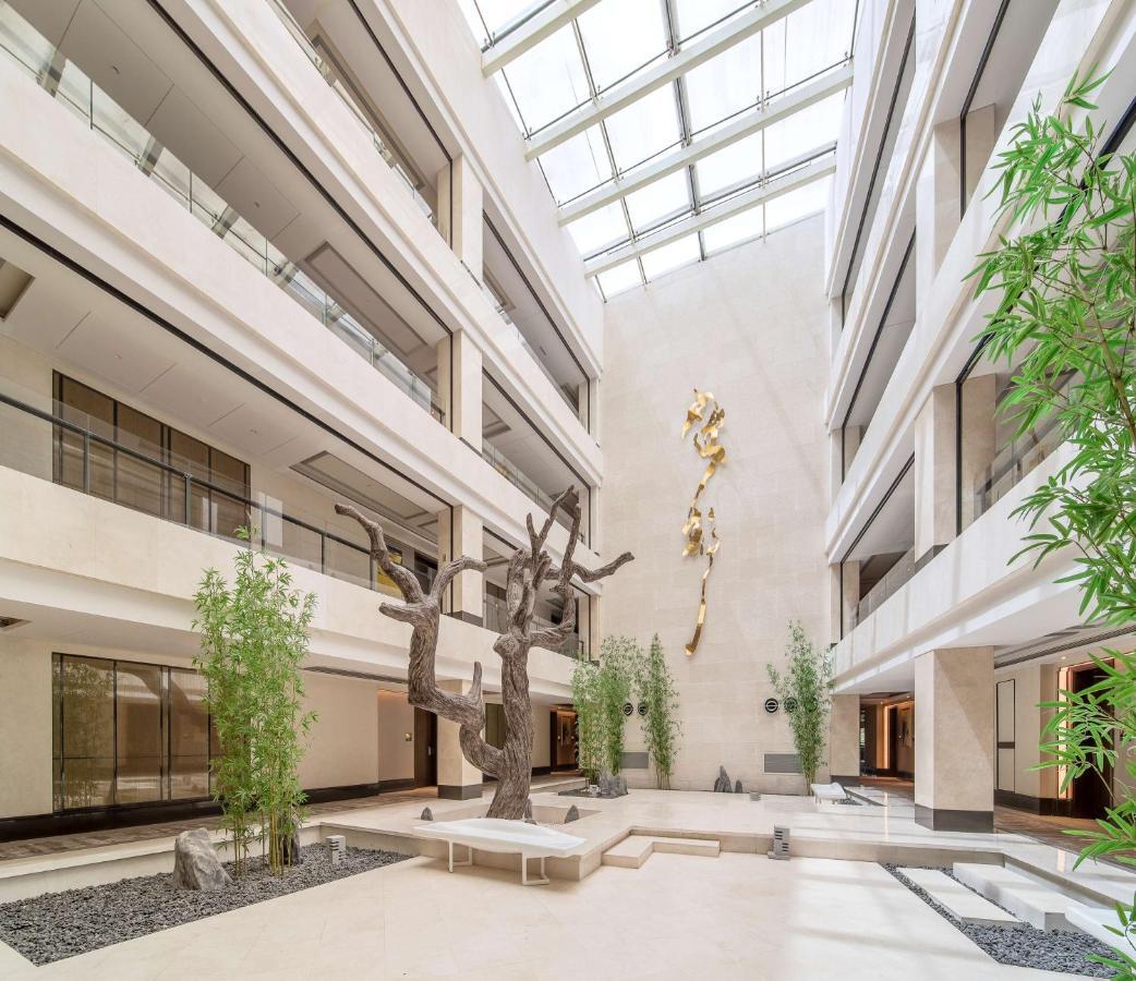 Radisson Blu Hotel Wuhan Etd Zone Exteriör bild